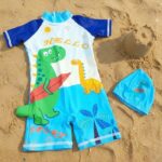 Ropa de Baño para Niño UV Dinosaurio Verde en Tabla de Surf