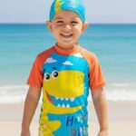 Ropa de Baño para Niño UV Dinosaurio Amarillo Sonriendo con Nubes - Imagen 2