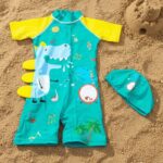 Ropa de Baño para Niño UV Dinosaurio Celeste Cantando