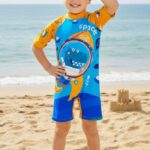 Ropa de Baño para Niño UV Celeste con Dinosaurio Astronauta en Nave - Imagen 2