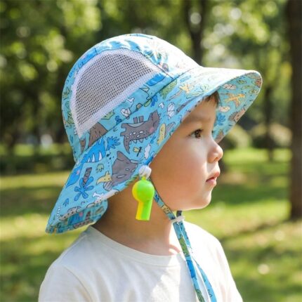 Sombrero con silbato amarillo con verde y diseño de dinosaurios